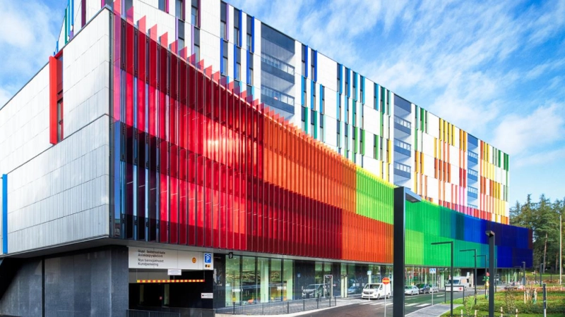 A colourful facade of a hospital building. - HUS A colourful facade of a hospital building. - HUS