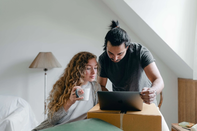 A woman and a man look at a laptop screen. - Ketut Subiyanto / Pexels A woman and a man look at a laptop screen. - Ketut Subiyanto / Pexels