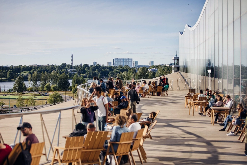 People gather on an outside terrace in Helsinki. - Jussi Hellsten / Helsinki Partners People gather on an outside terrace in Helsinki. - Jussi Hellsten / Helsinki Partners